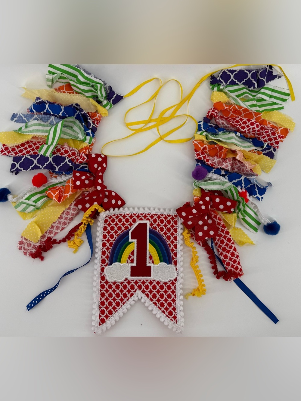rainbow-themed 1st birthday highchair banner